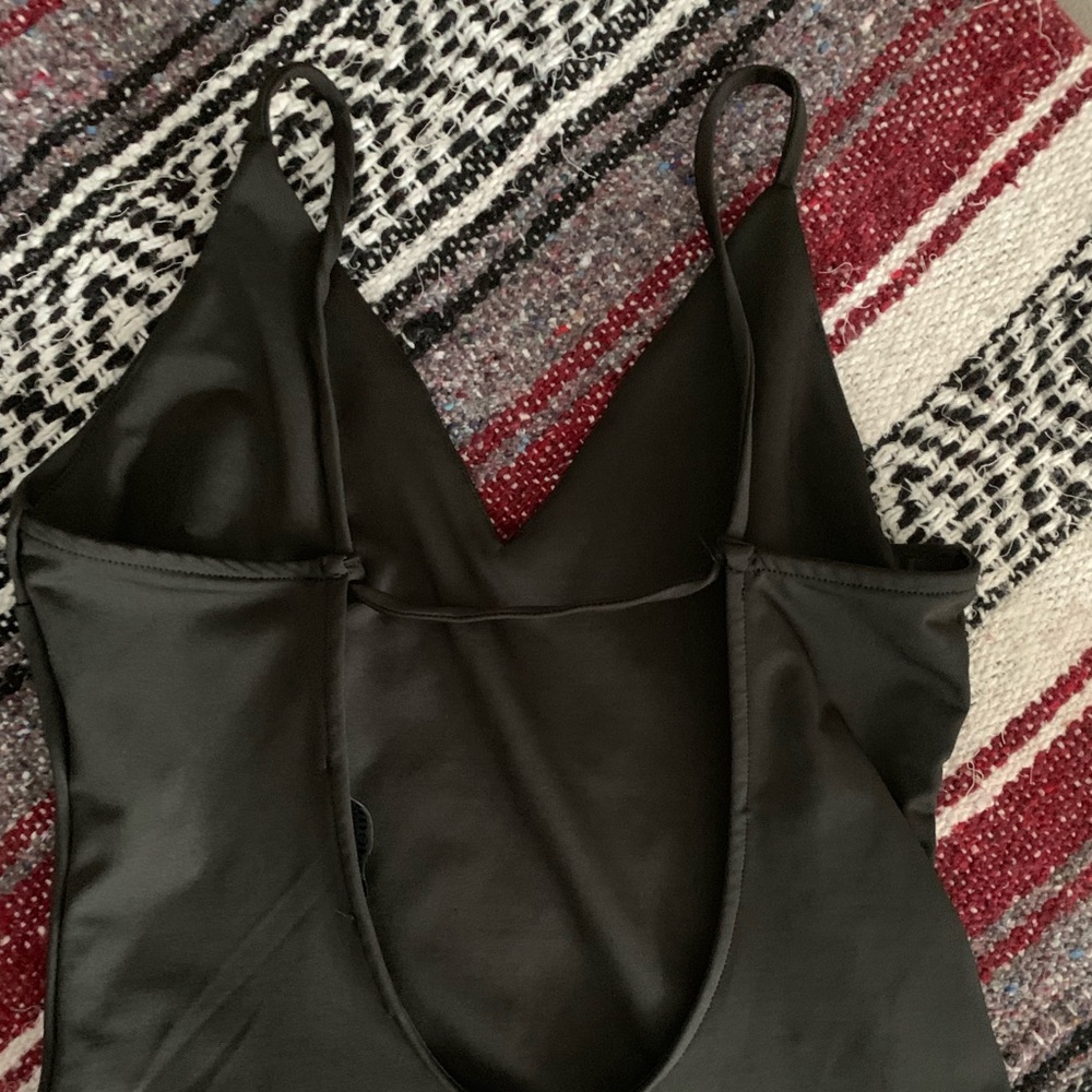 One piece black tank top